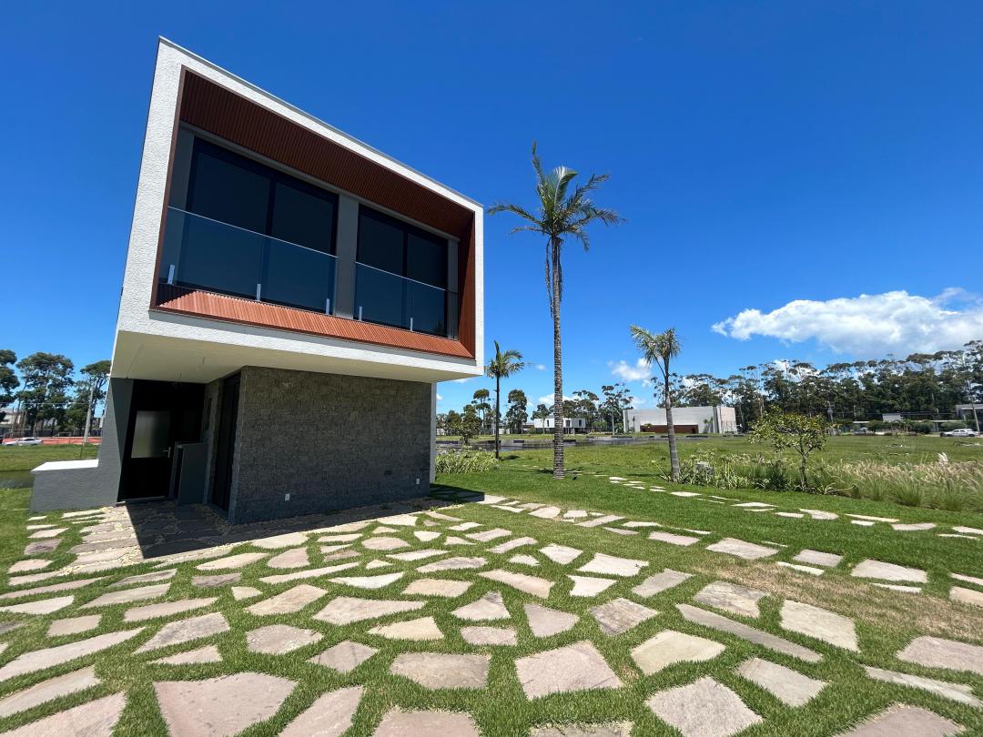 Casa em Condominio à venda em Condominio Amaná Atlântida, Xangri-Lá - Novo e Pronto para Morar!